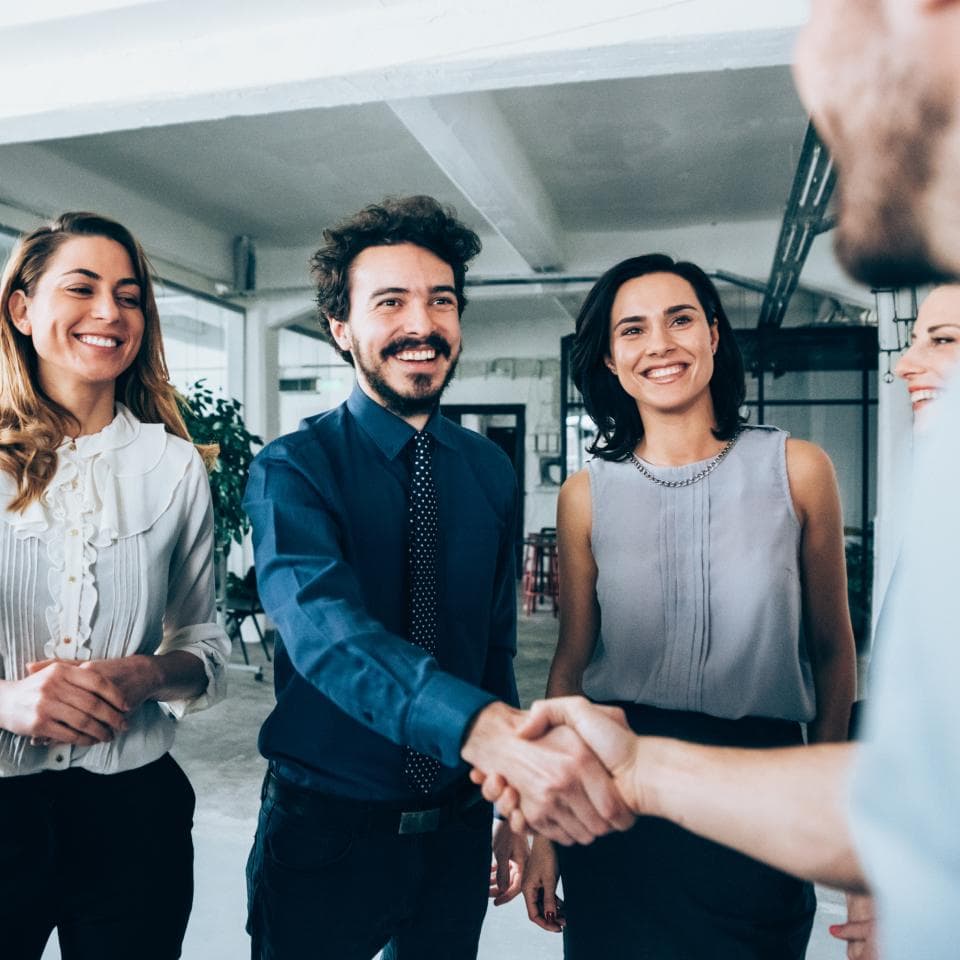 group shaking hands